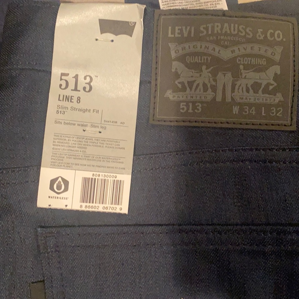 Levis 513 34x32 blue with black stitching